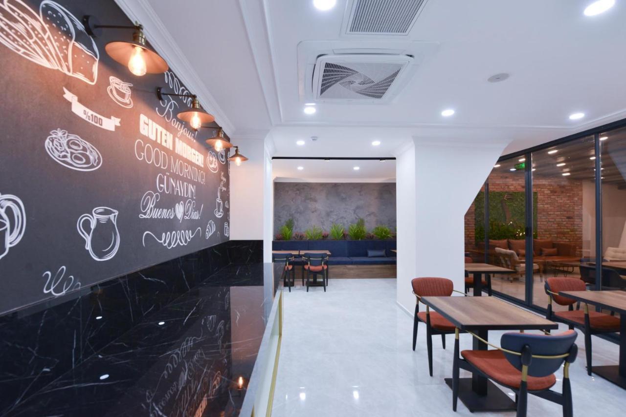 Istport Garden Hotels Arnavutkoy Exterior foto The interior of a typical Starbucks store