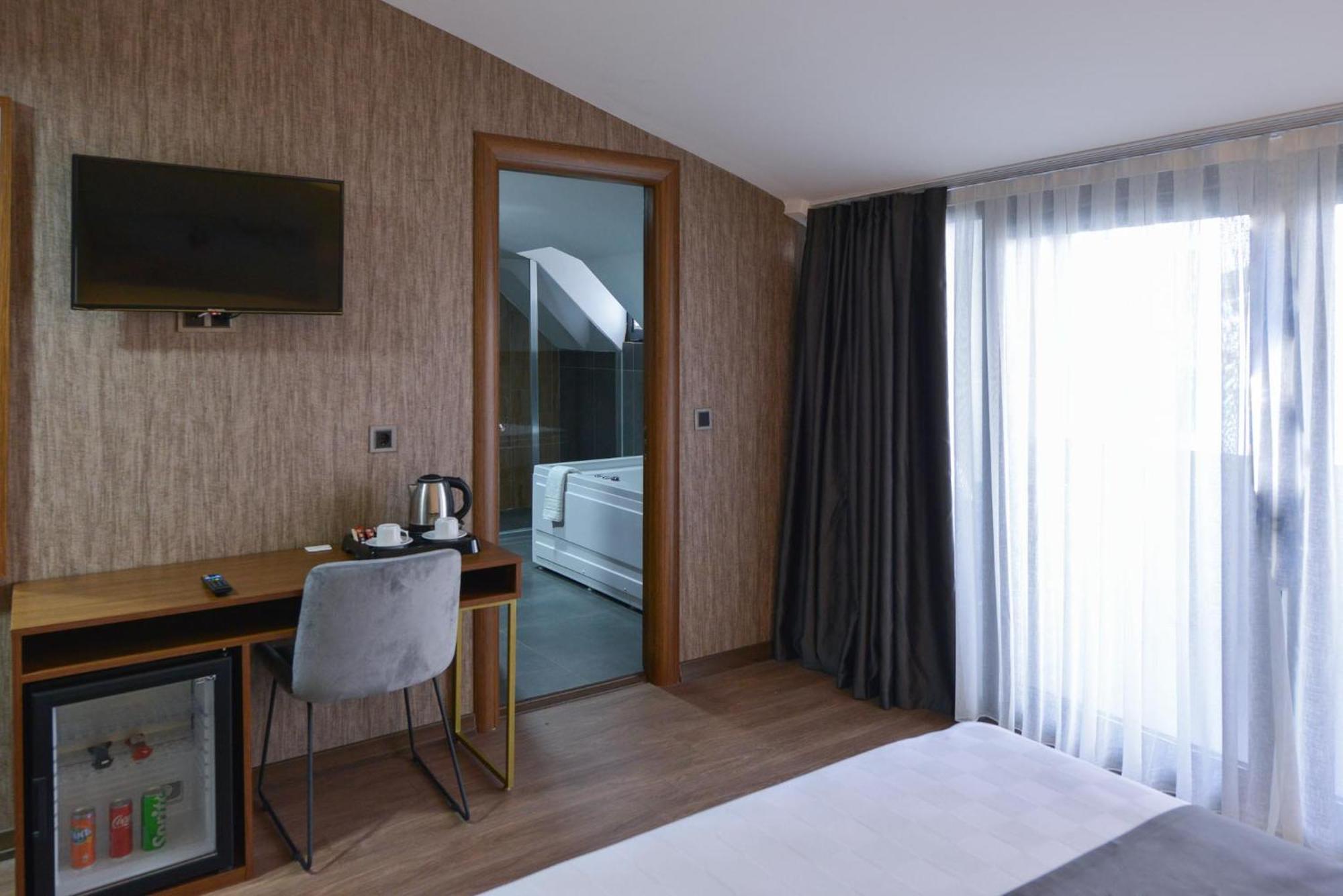 Istport Garden Hotels Arnavutkoy Quarto foto A room at the hotel